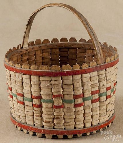Painted picket fence basket, early 20th c., 10 1/2'' h., 9 1/2'' w.