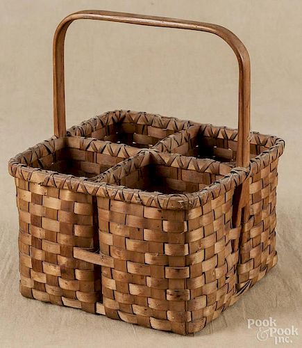 Basketry bottle carrier, early 20th c., 11'' x 9 1/4''.