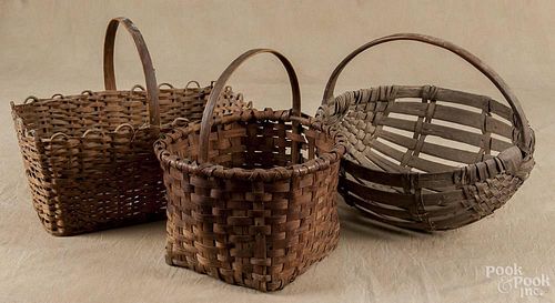 Split oak potato basket, late 19th c., 14 1/2'' h., 16'' w., together with two other gathering baskets