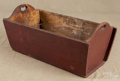 Pennsylvania painted pine carrier, 19th c., with heart cutout ends, 10'' h., 22'' w., 10 1/2'' d.