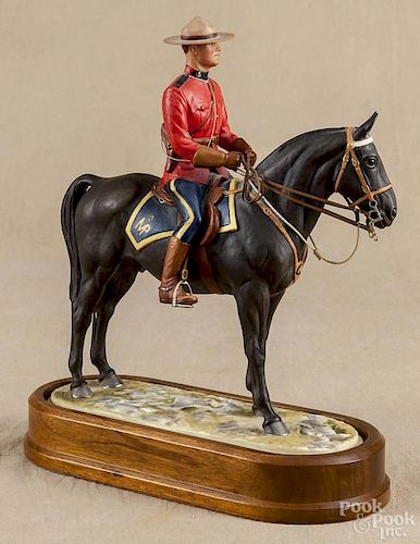 Royal Doulton porcelain figure of a Royal Canadian Mounted Policeman, 11'' h.