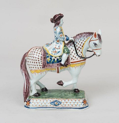 Delft Figure of a Rider on Horseback and Two Staffordshire Porcelain Spill Vases