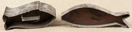 Tin fish-form food mold, 19th c., 8'' l., together with a fish-form cookie cutter, 10 1/4'' l.