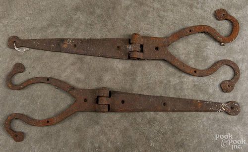 Pair of wrought iron strap hinges, ca. 1800, 24 1/2'' l.