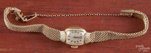 Ladies 14K yellow gold Hamilton wrist watch, with a gold mesh band, 13.2dwt.