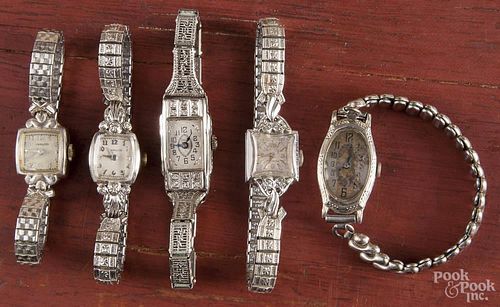 Five ladies wrist watches, to include gold cases, stretch bands, etc.