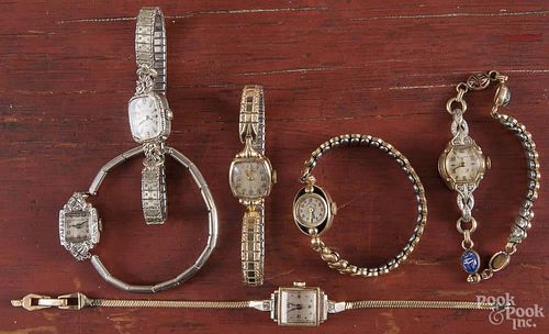 Six ladies wrist watches, to include gold cases, gold-filled stretch bands, etc.