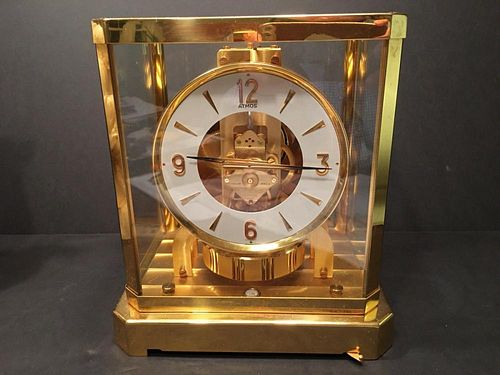 A large fine Brass Air powered Clock, 9" x 7 1/2" x 5 1/2"