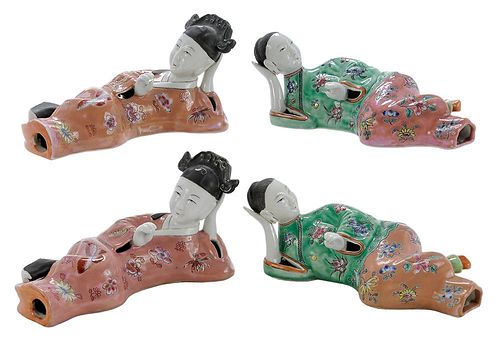 Group of Four Asian Porcelain Reclining Figures