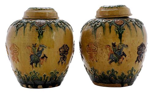 Pair Sancai-Glazed Covered Jars with Buddhist Symbols