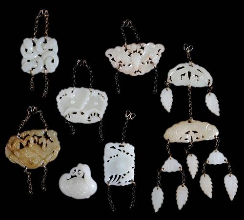 Seven Carved Jade Pendants with Chains
