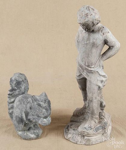 Lead garden figure of a boy, 18'' h., together with a composition squirrel, 8 1/4'' h.