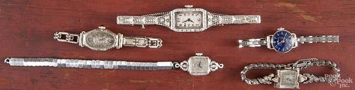 Five ladies wrist watches, to include 18K, 14K cases, with various bands.