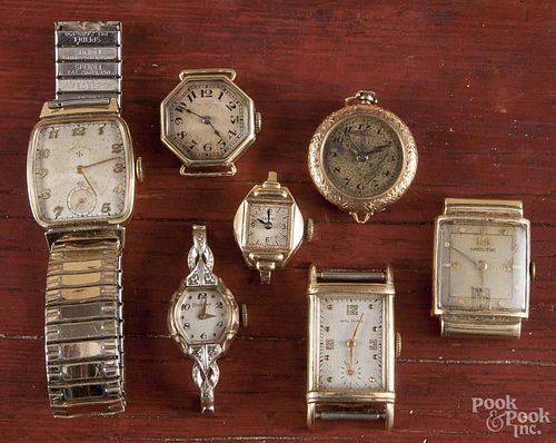 Seven lady's and men's wrist watches, one with a band, to include gold and gold-filled cases