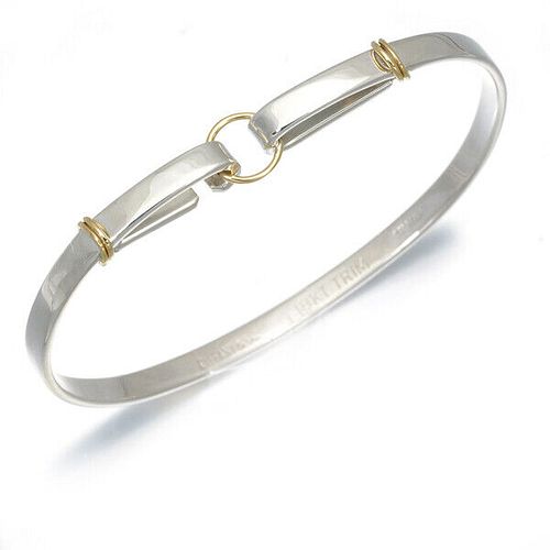 TIFFANY & CO. STERLING SILVER & 18K YELLOW GOLD HOOK BANGLE BRACELET for  sale at auction on 28th March