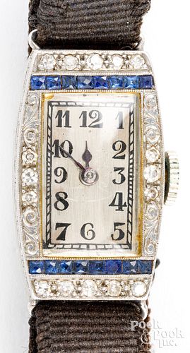 Platinum wristwatch with diamonds and sapphires