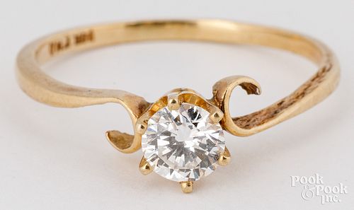 14K yellow gold solitaire ring with diamond