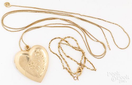 14K yellow gold locket on chain, and a 14K chain