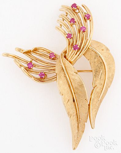 14K yellow gold brooch with gemstones