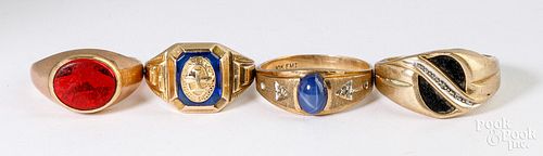 Four 10K yellow gold rings