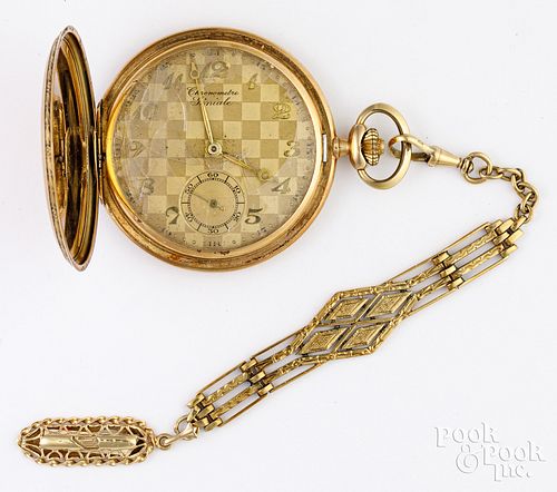 14K gold pocket watch with a chain