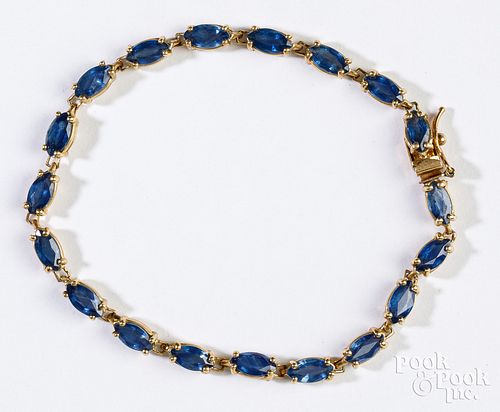14K yellow gold bracelet with blue sapphires