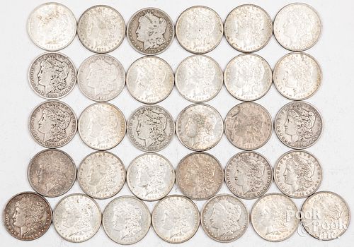 Thirty-one Morgan silver dollars