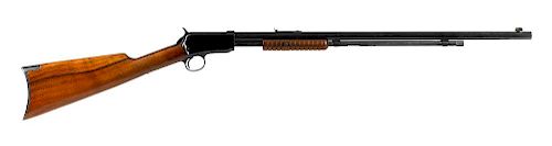 Winchester model 1890 slide action take down rifle, .22 short caliber with walnut stock and 24'' oc