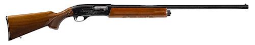 Remington model 1100 semi-automatic shotgun, 12 gauge, 2 3/4'' chamber with checkered walnut pistol