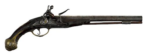 European flintlock pistol, approximately .60 caliber, with an ornately engraved and inlaid brass t