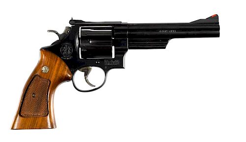 Smith & Wesson model 29-3 revolver, .44 magnum, with blued finish, walnut grips, and a 6'' round ba