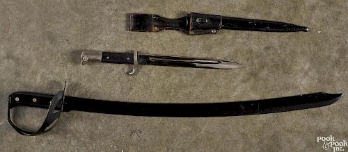 Three edged weapons, to include a US Model 1840 cavalry saber, with wire wrapped grip and unmarked