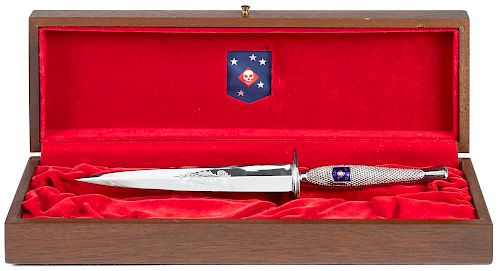USMC commemorative fighting knife, having a polished cast on checkered panels style grip, with a d