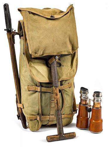 WW I US Army haversack, inscribed R.I.A. 1918, with an entrenching tool and a bayonet and scabba