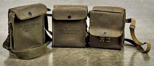 Two WW II era US Army Signal Corps field telephones, EE-8-B, in canvas bag, one stenciled 3rd D
