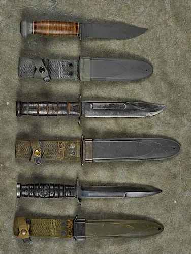 Three WW II era fighting knives, to include a USN MK 2 Ka Bar with sheath, 6 3/4'' blade, a US M