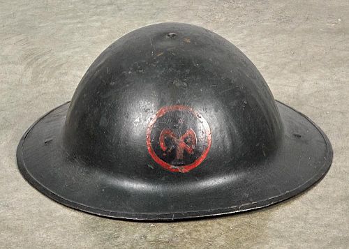 U.S. WW I 27th division Brodie helmet, with painted insignia and original liner, stamped HS79 on