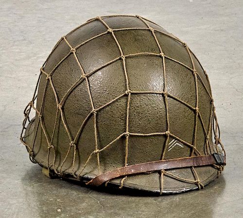 WW II helmet, with mesh cover.