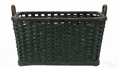 Large painted split oak field basket, late 19th c., retaining an old green surface, 14'' h., 27 1/2''