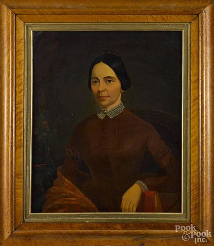 Oil on canvas portrait of a woman, mid 19th c., 30 1/2'' x 25''.
