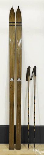 Pair of Zuber St. Moritz skis, 82 1/2'' l., together with a pair of bamboo poles, 49'' l.