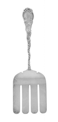 * An American Silver Asparagus Serving Fork, William B. Durgin Co., Concord, MA, Circa 1895, Louis XV pattern, handle terminal e