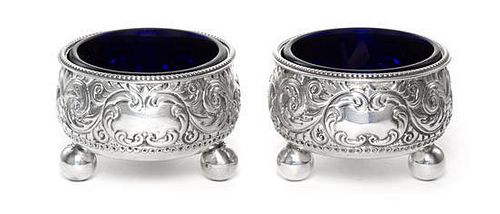 A Pair of Victorian Silver Salts, William Evans, London, 1882, in Georgian style, the circular bodies chased with scrolling acan