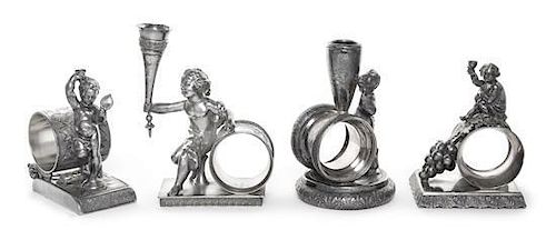 A Group of Four Figural Napkin Rings with Putti, Various Makers, Late 19th/Early 20th Century, comprising an example with a drap
