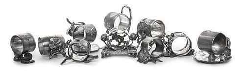 A Group of Ten American and Canadian Silver-Plate Figural Napkin Rings with Flowers, Various Makers, Late 19th/Early 20th Centur