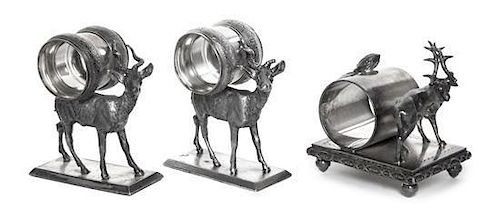 Three American Silver-Plate Figural Napkin Rings with Deer, Late 19th Century, comprising a pair on rectangular bases with deer