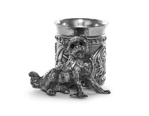 An American Silver-Plate Figural Napkin Ring with a Dog, James W. Tufts, Boston, MA, Late 19th Century, formed as a seated dog w