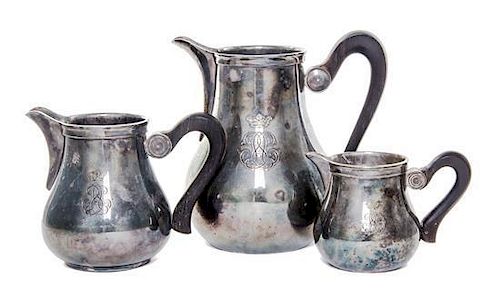 * Three Austrian Silver Small Pitchers, Circa 1930, comprising a small water pitcher, hot milk pitcher and creamer, all of balus