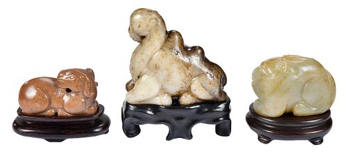 Three Carved Jade Animals with Stands