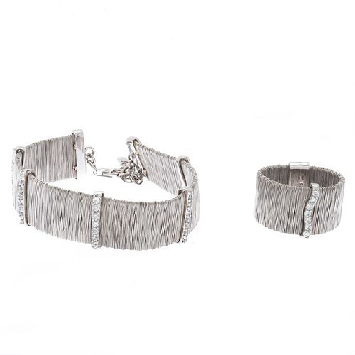 Pulsera y anillo con simulantes en plata .925. Diseño de hilos. Peso: 29.8 g.